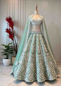luxurious and iconic Mint green lehenga with ivory hand embroidery