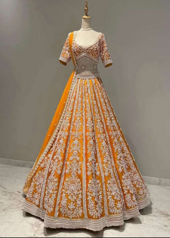 Fetching Mustard Raw Silk Designer Bridal Wear Lehenga Choli