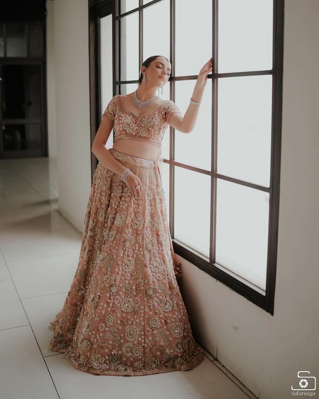 Wonderful Rose Pink Color Net Bridal Wear Designer Lehenga Choli