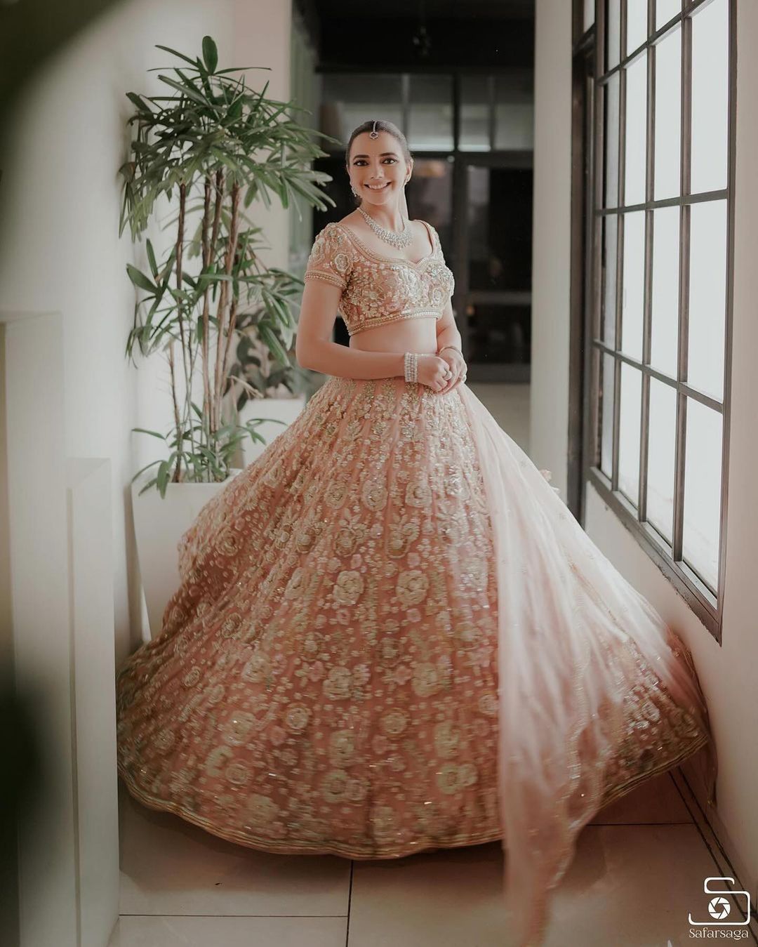 Wonderful Rose Pink Color Net Bridal Wear Designer Lehenga Choli