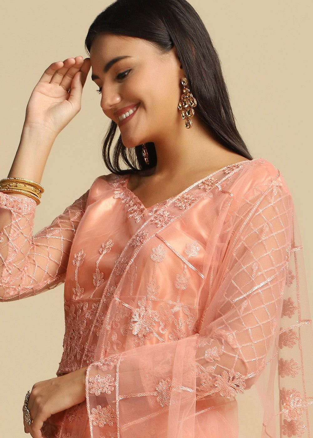 Comely Light Peach Color Net Festival Wear Lehenga Choli